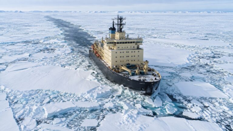 Polar icebreaker navigating thick Arctic Ocean sea ice