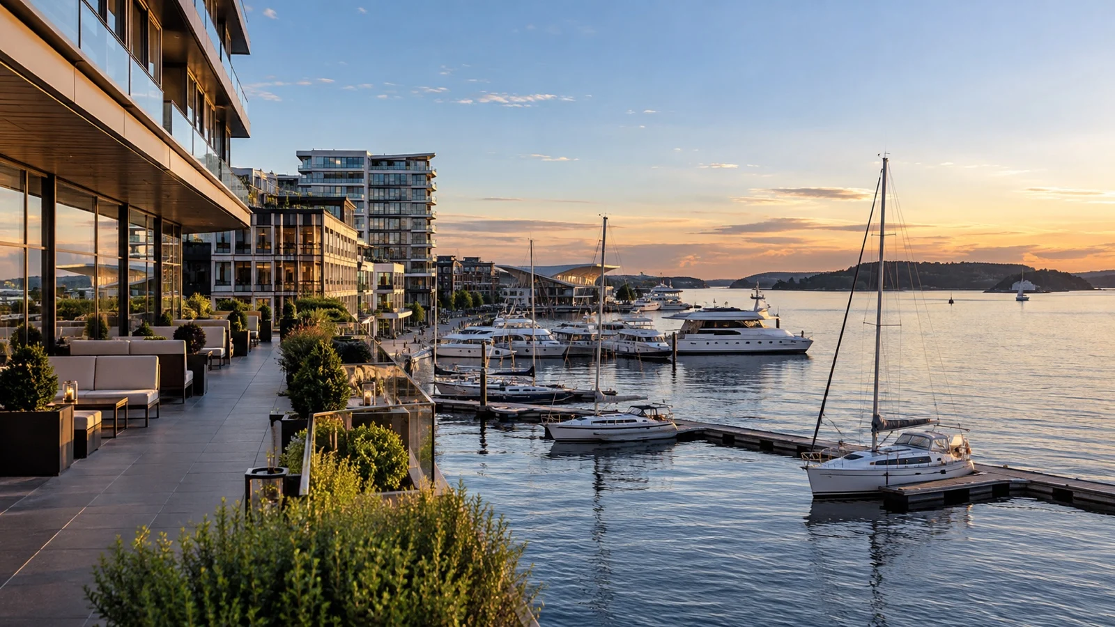 Elegant Oslo waterfront hotel near Aker Brygge overlooking boats and the Oslofjord