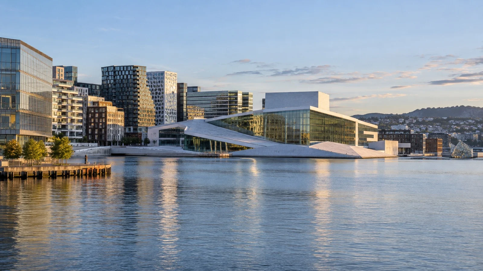 Bjørvika district of Oslo with contemporary hotels, Oslo Opera House and fjord water