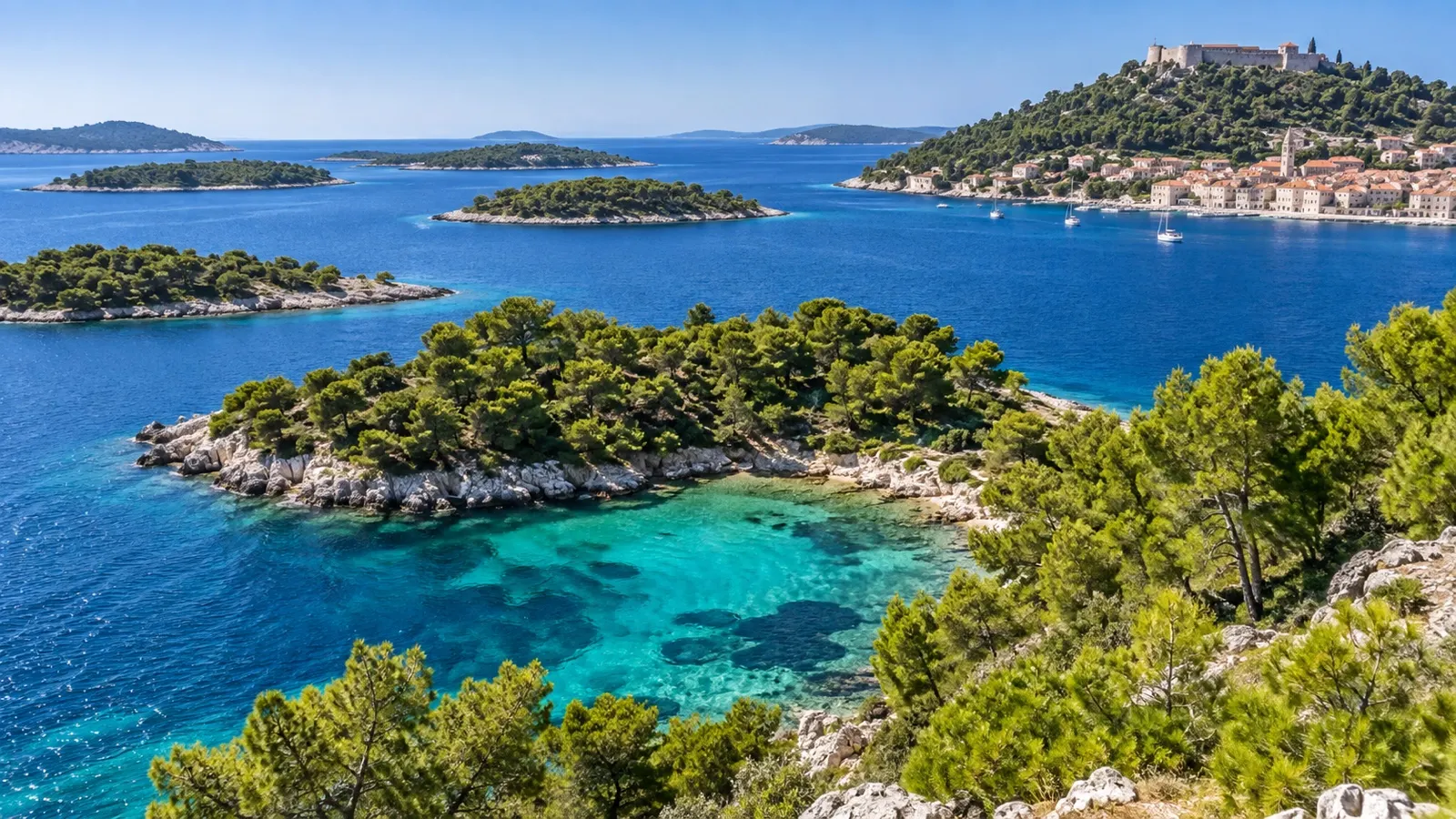Pine-covered Pakleni Islands and turquoise cove near Hvar