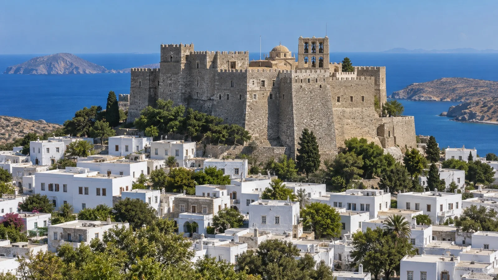 Fortress-like Monastery of Saint John above white houses in Chora, Patmos