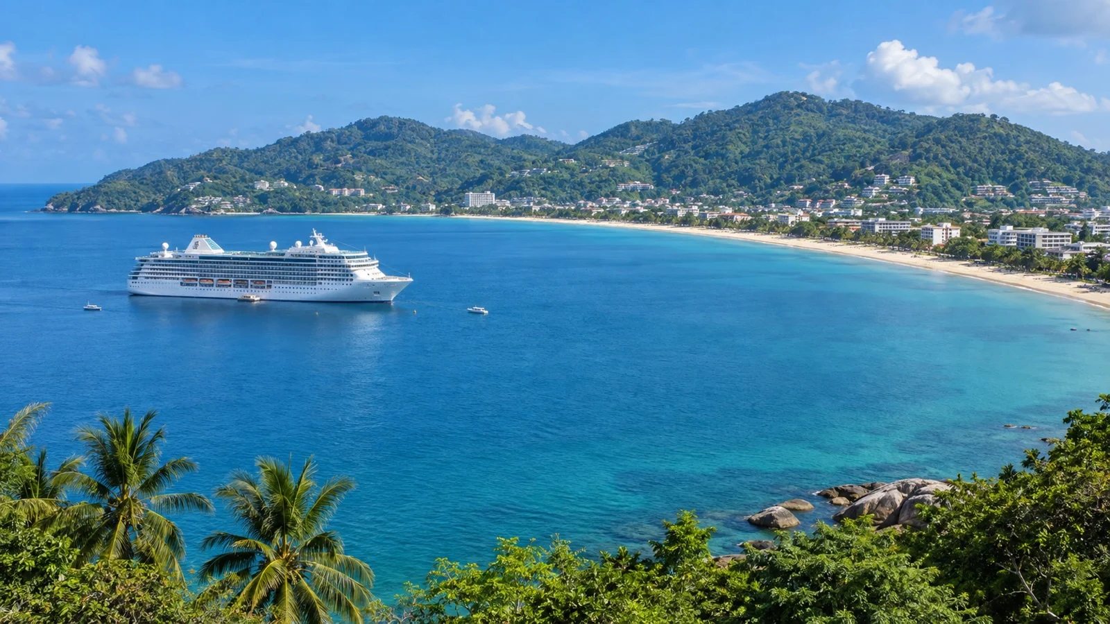 Cruise ship anchored off Phuket's tropical coastline