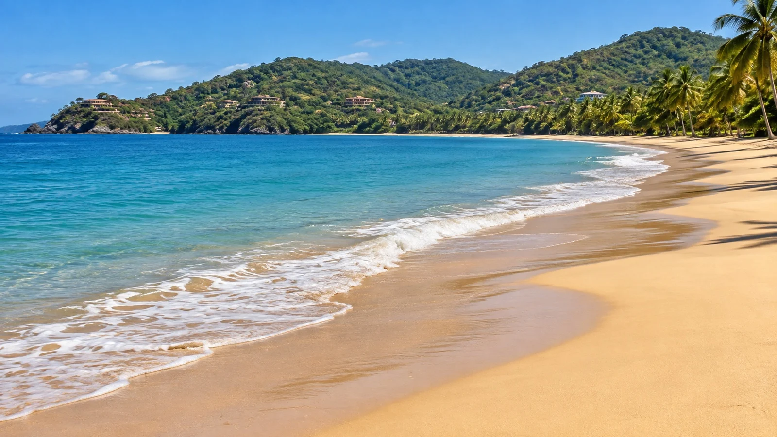 Wide sandy shore at Playa La Ropa, Zihuatanejo