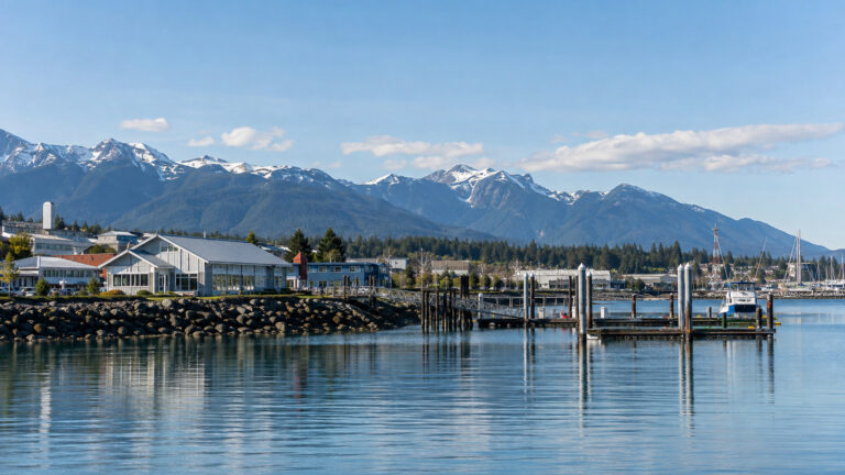 Port Angeles Washington cruise waterfront and harbor, Olympic Mountains behind, small pier and no people