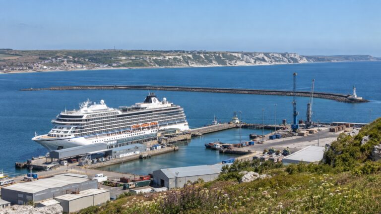 Cruise ship at Portland Port beside Dorset’s coastline