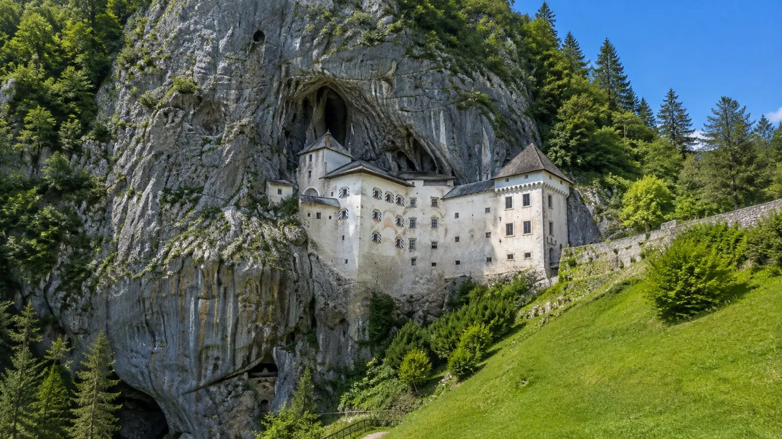 Predjama Castle built into a limestone cliff in Slovenia