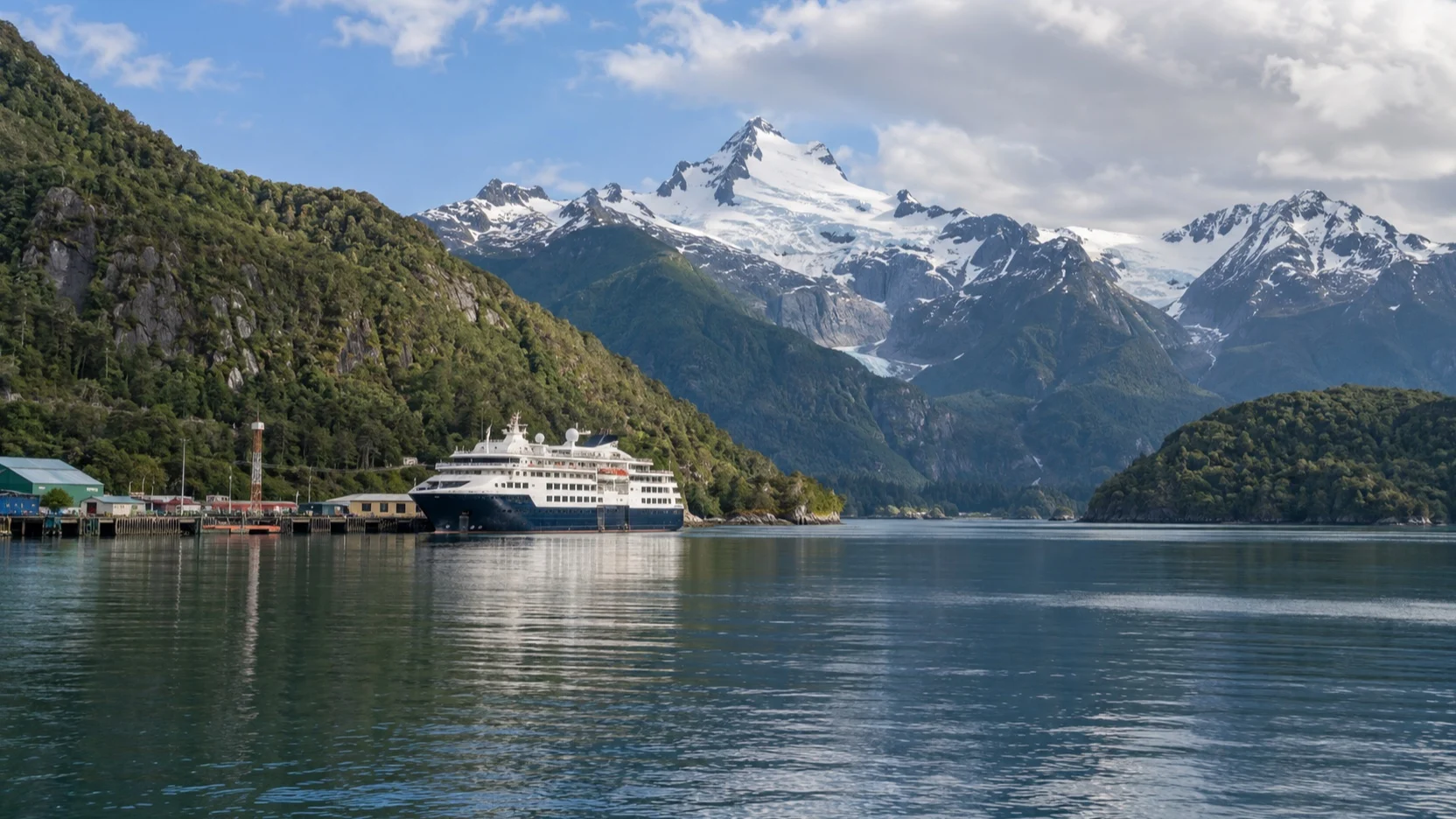 Small cruise ship in a Patagonian fjord near Puerto Chacabuco