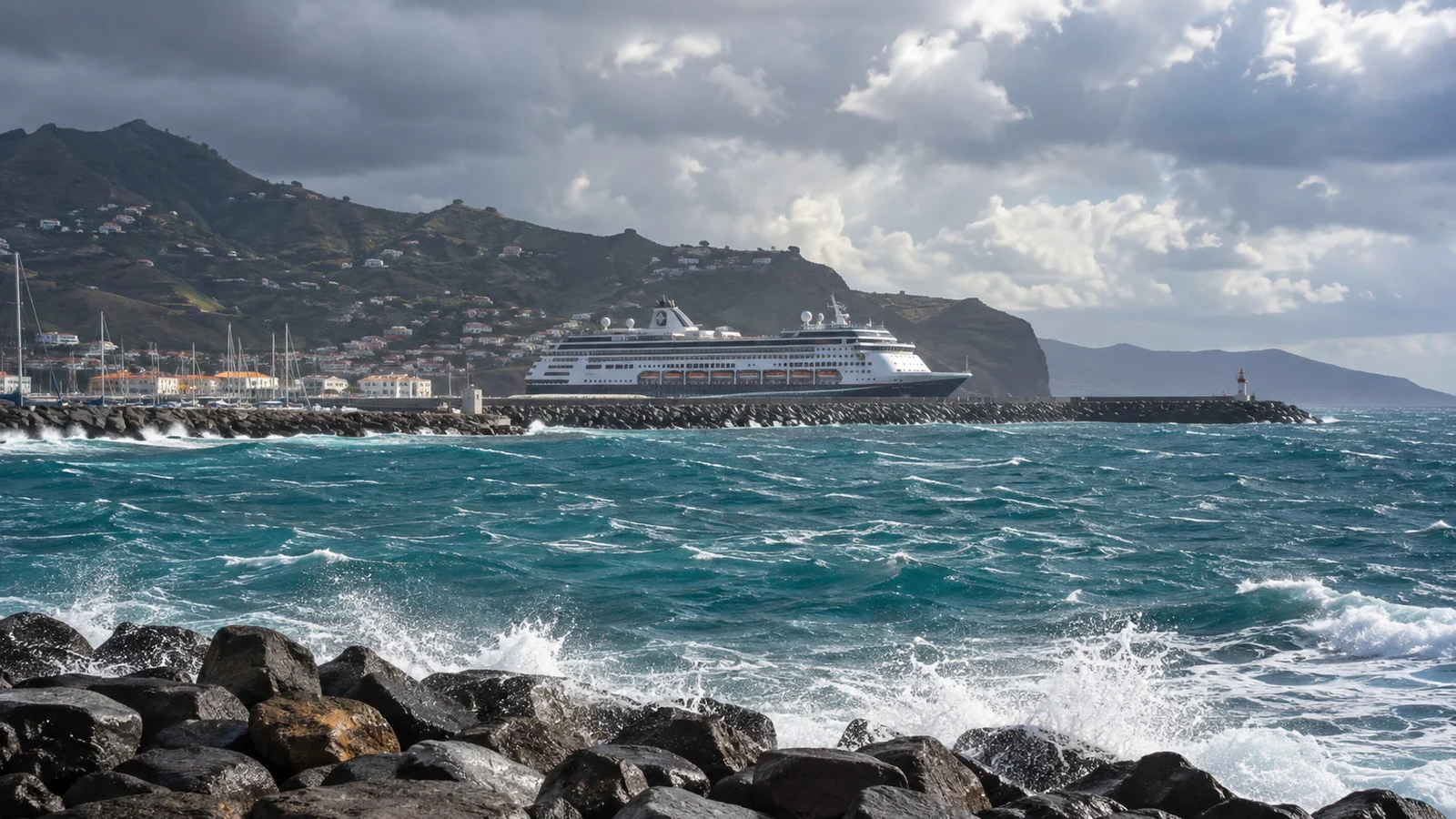 Cruise ship sheltered behind harbor breakwater during windy weather