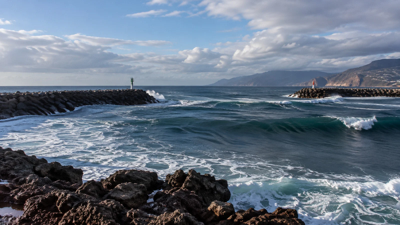 Long-period swell entering a harbor past a breakwater