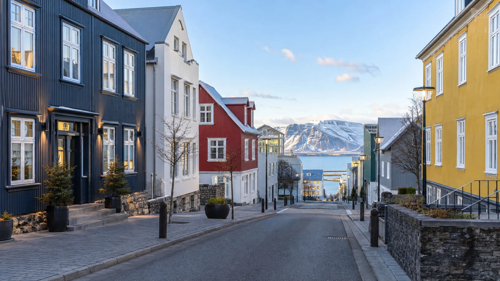 Quiet downtown Reykjavík street with colorful simple hotel buildings, Icelandic architecture and clear cool daylight