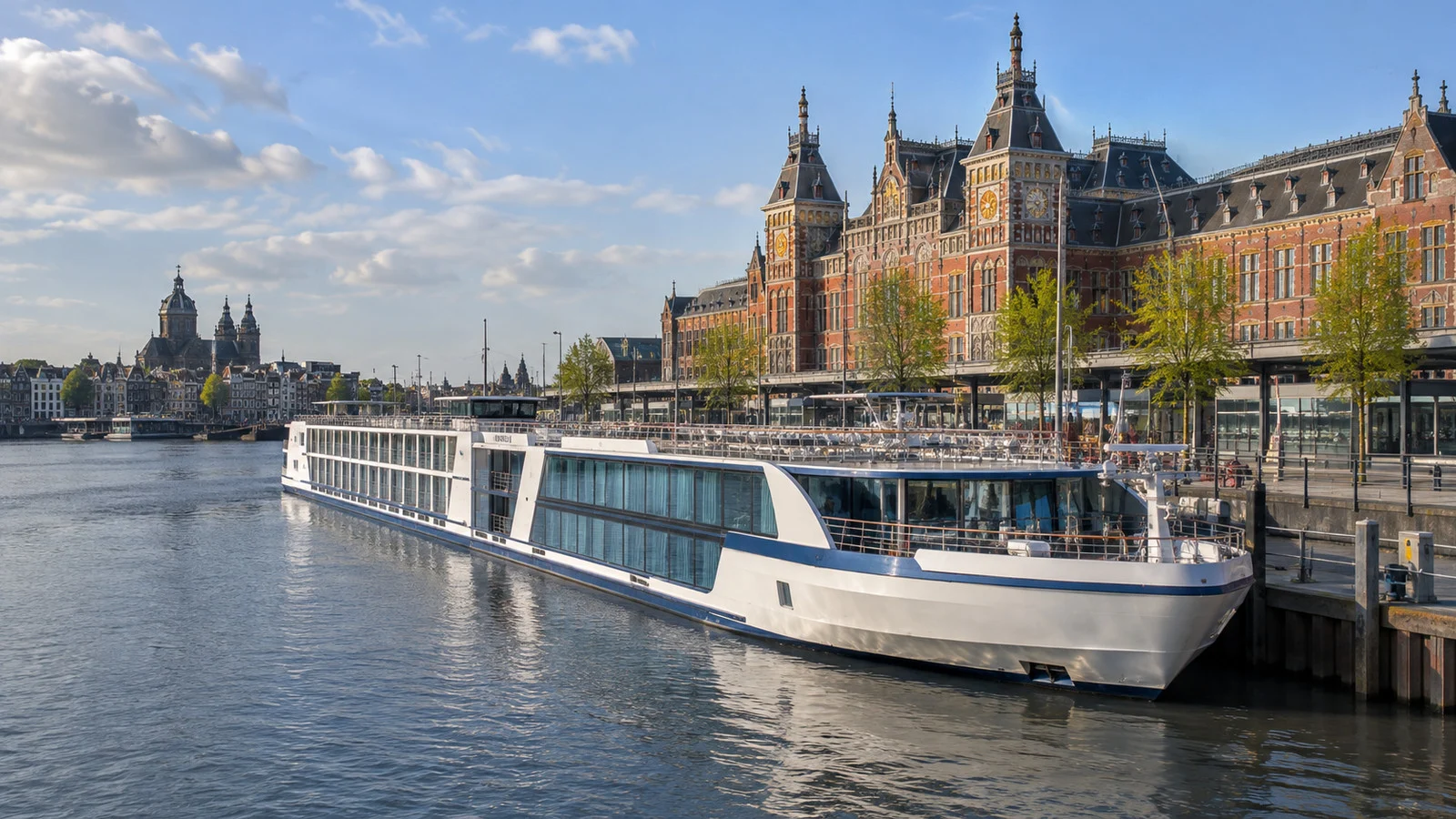 Amsterdam river cruise ship at a city quay near Centraal Station