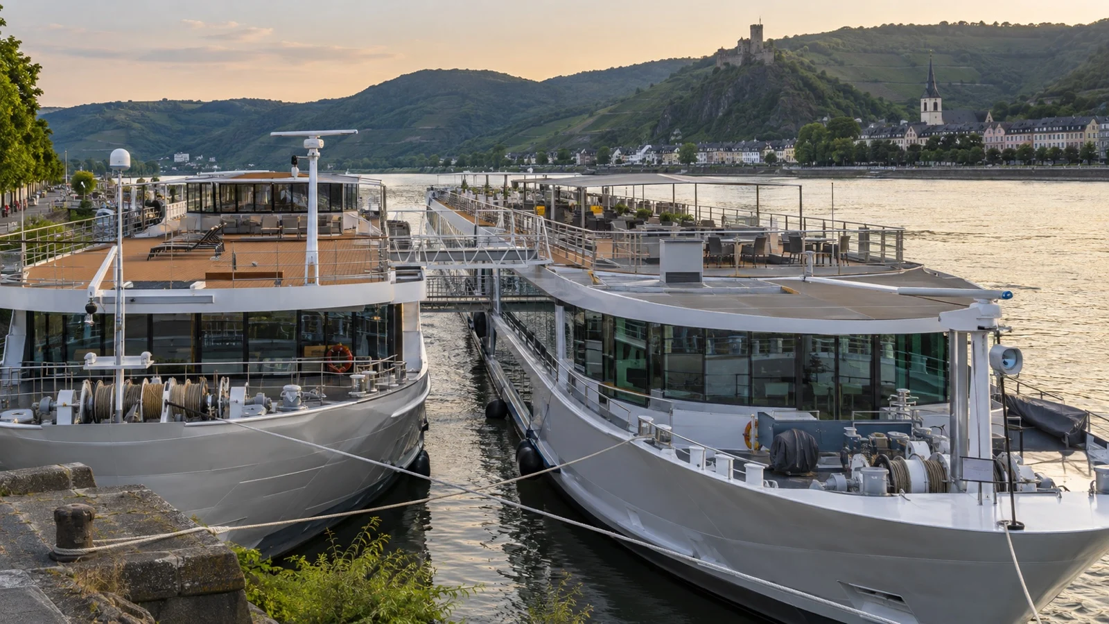 Two river cruise ships rafted side by side with connecting gangways