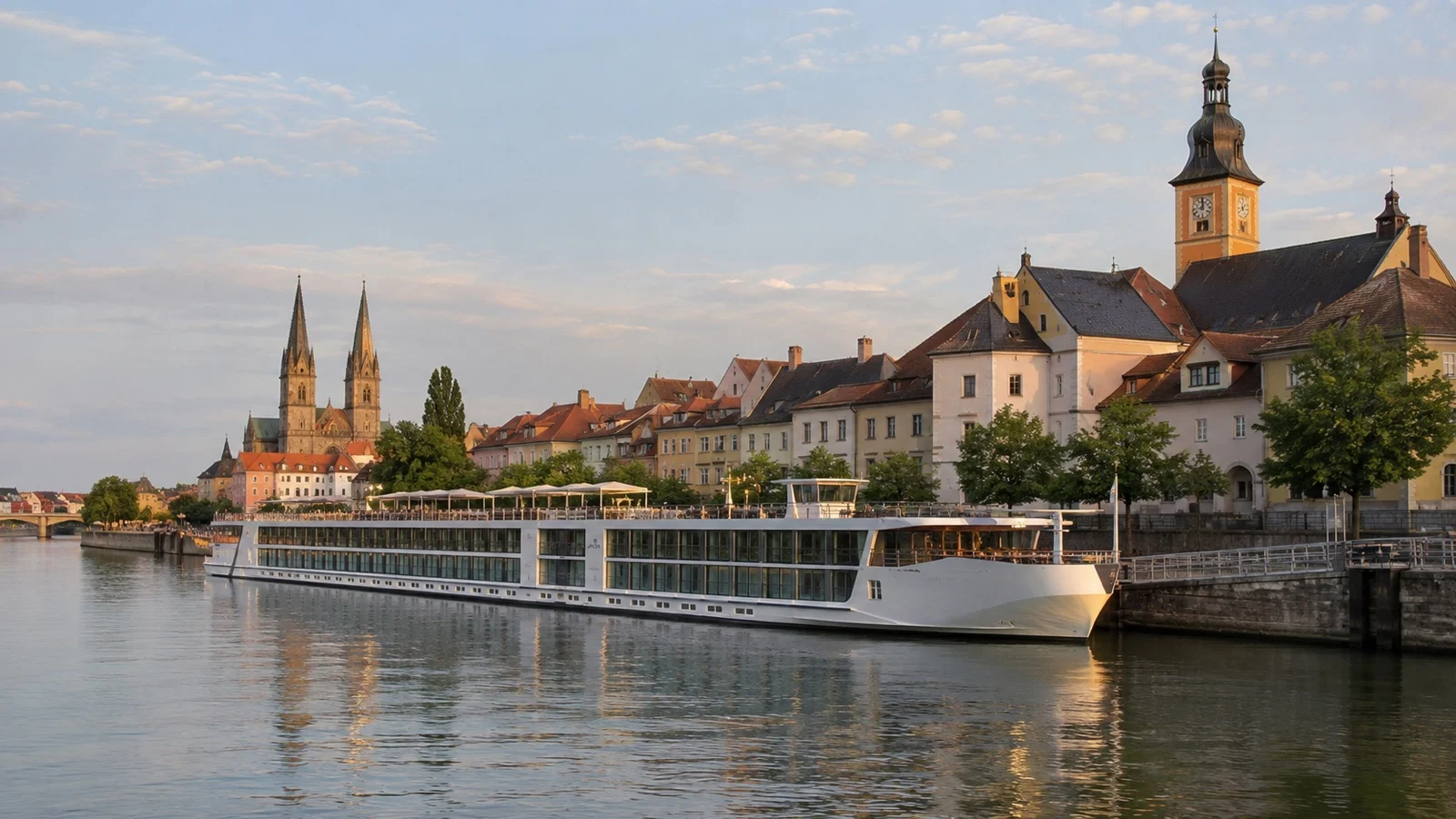 River cruise ship beside European city center