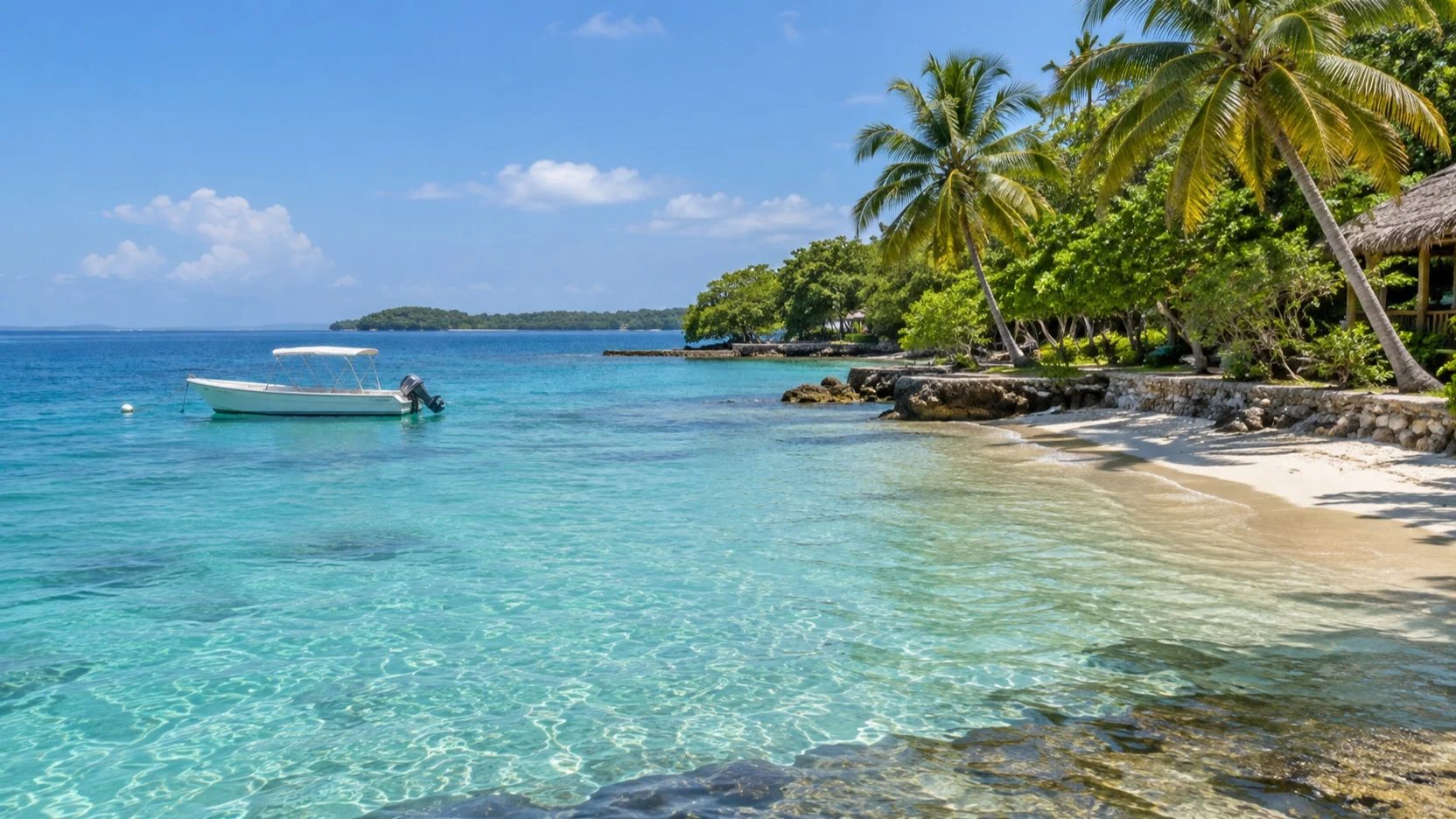 Turquoise water and an empty palm-lined beach in the Rosario Islands near Cartagena