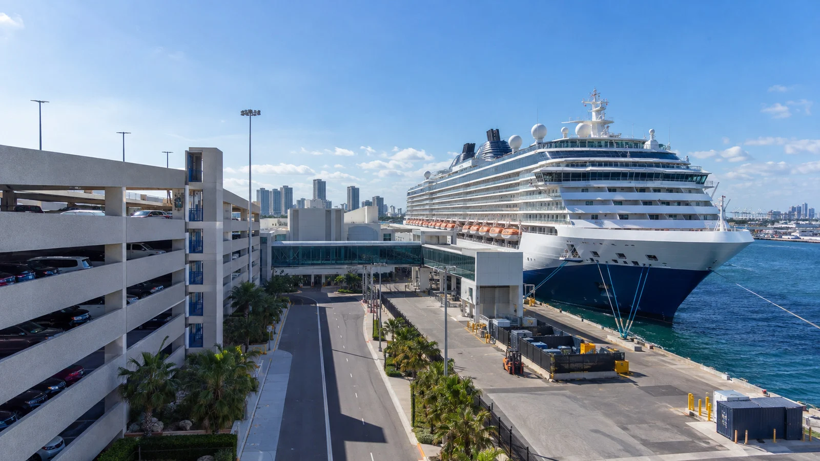 Cruise ship beside a parking garage at Port Everglades for a round-trip sailing