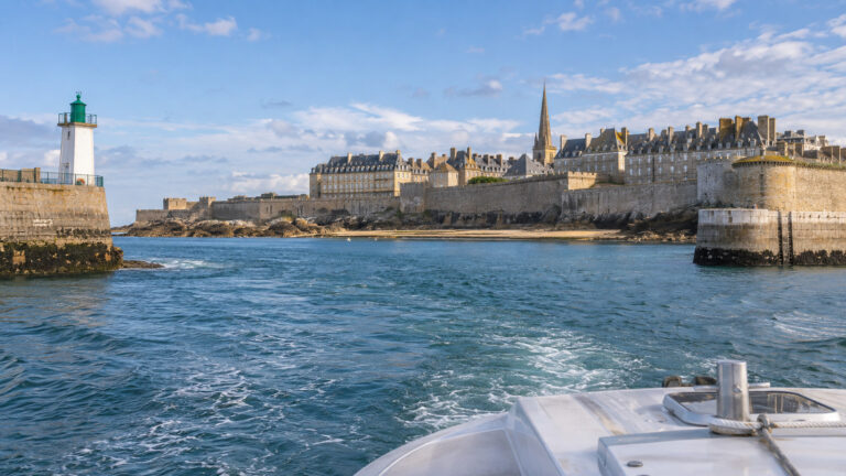 Cruise tender approaching Saint-Malo's walled city harbor