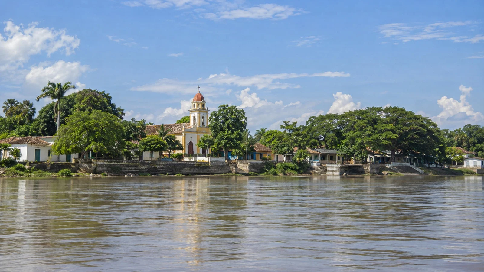 Town waterfront viewed from the Magdalena River in Colombia