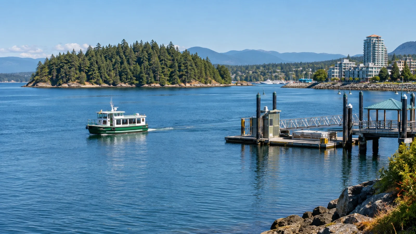 Passenger ferry approaching forested Saysutshun island near Nanaimo