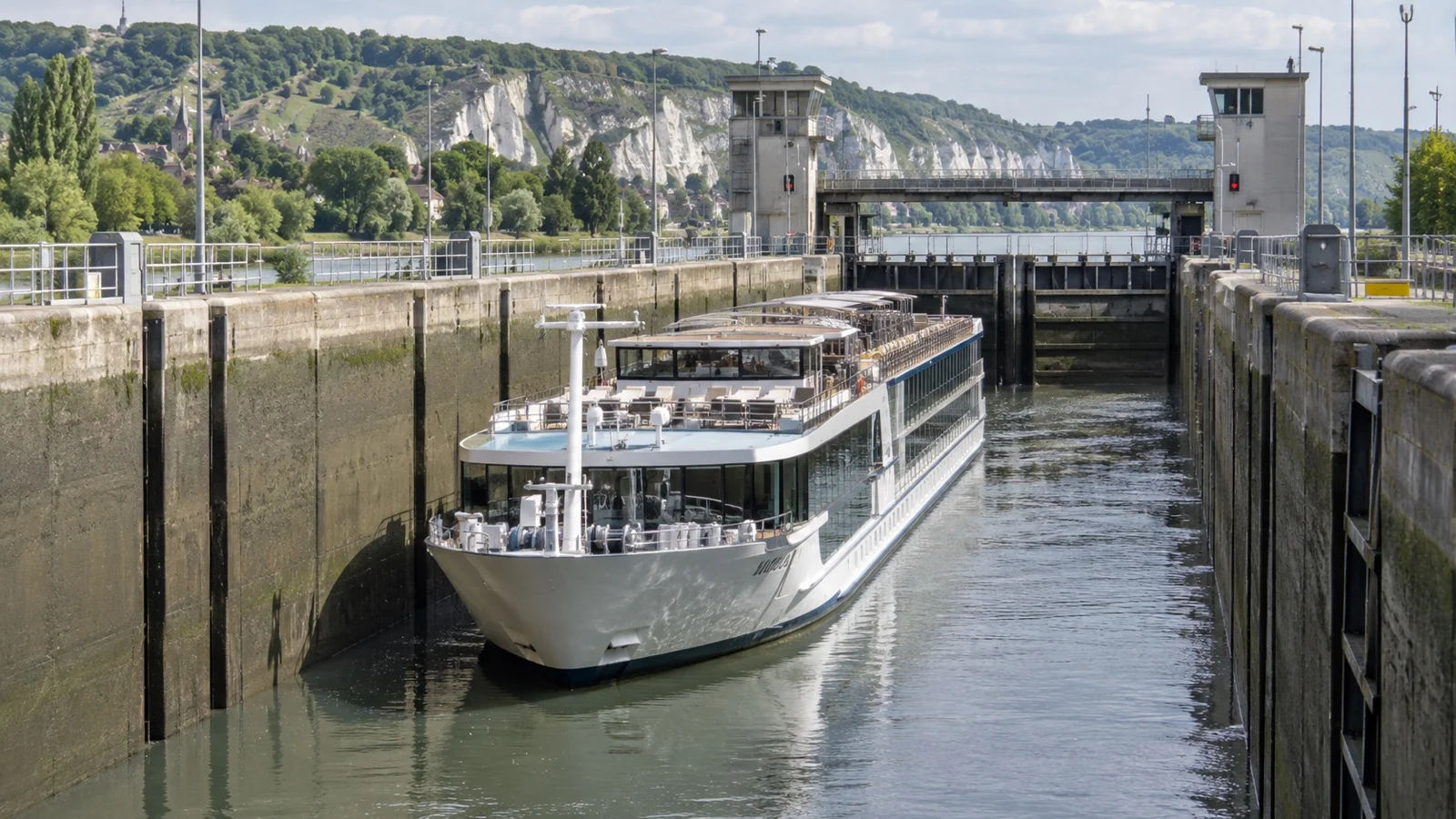 River cruise ship passing Seine lock