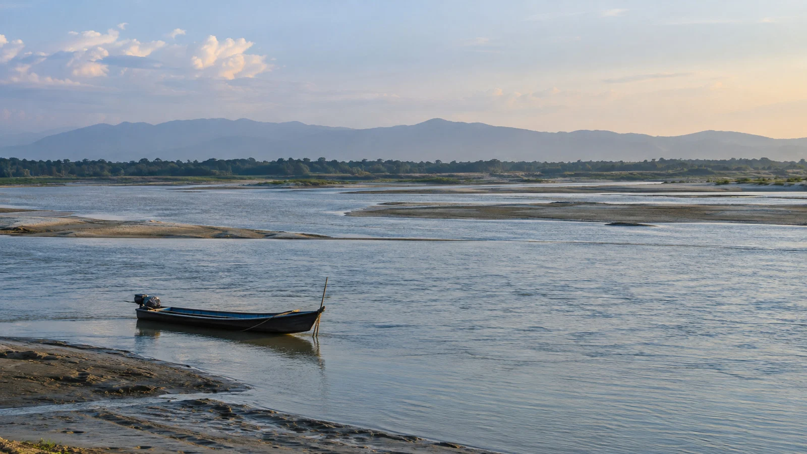 Small river boat on the braided Brahmaputra