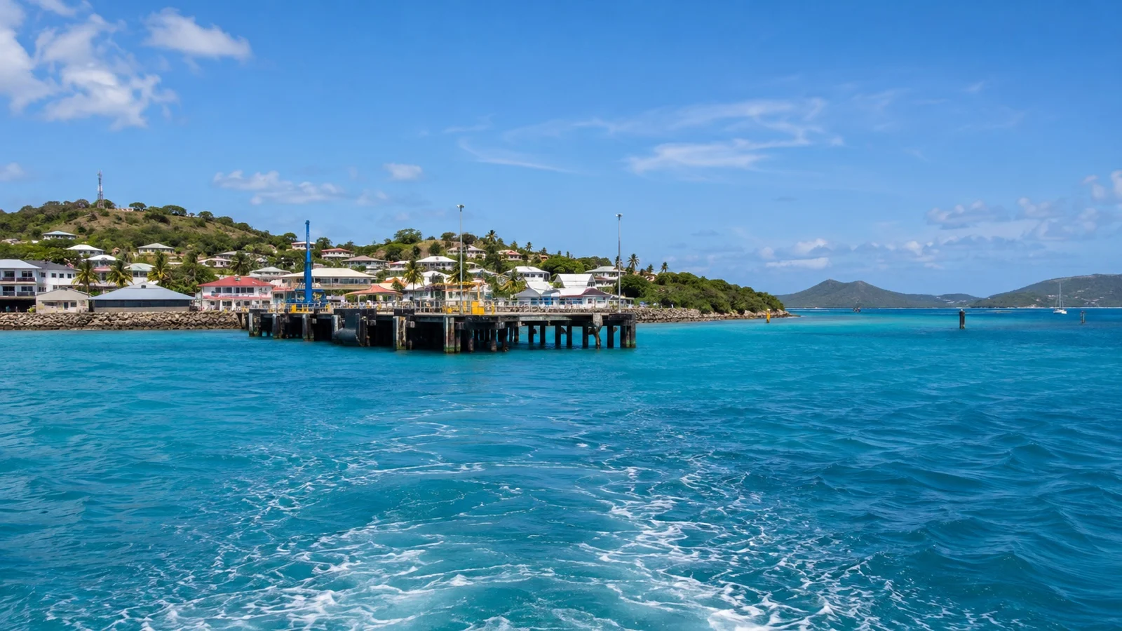 Tender boat approaching Thursday Island jetty in Torres Strait