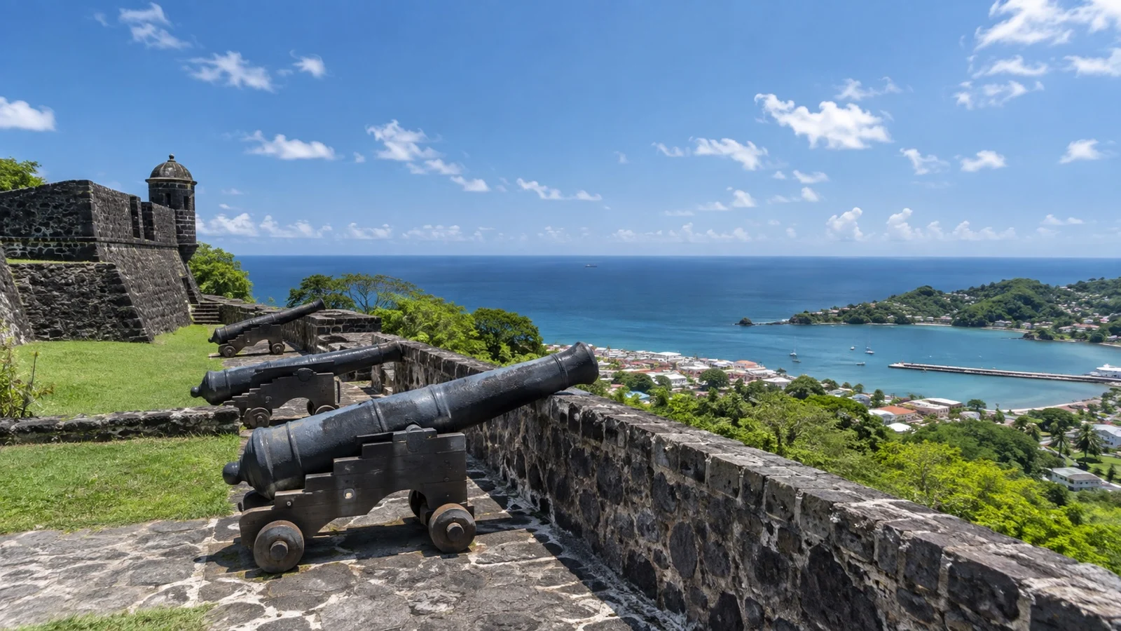 Historic cannons and sea view at Fort King George on Tobago