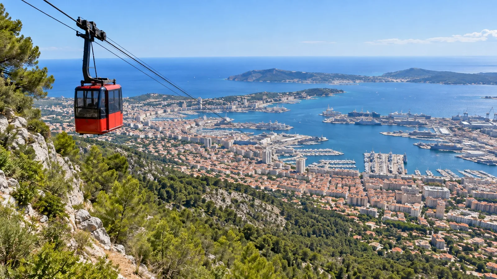 Cable car above Mont Faron with Toulon harbor below
