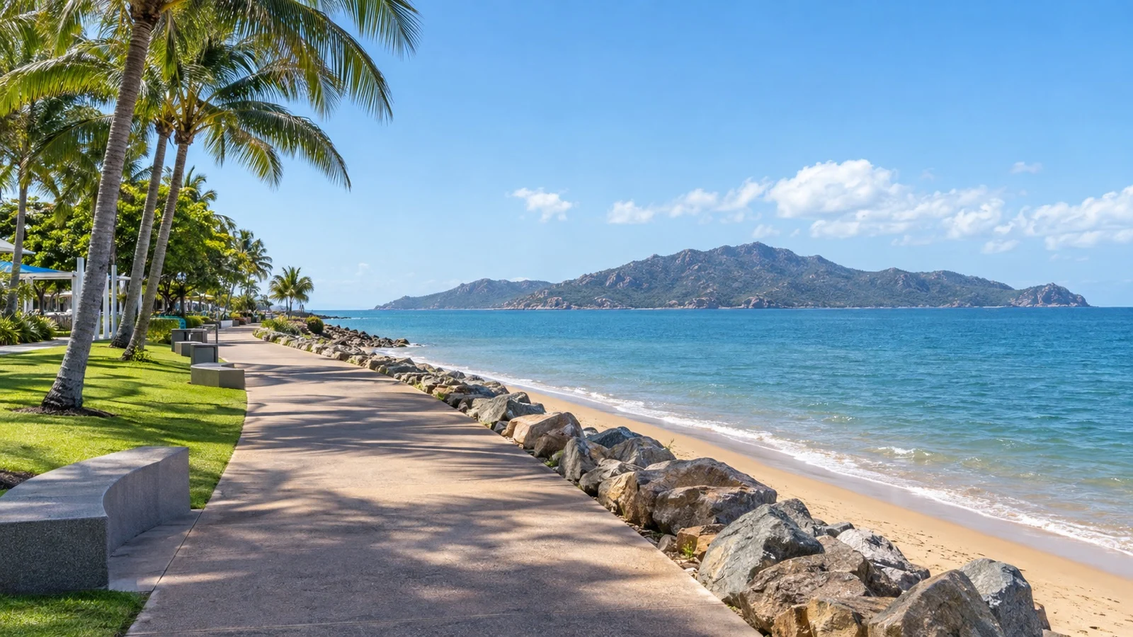 The Strand promenade in Townsville with Magnetic Island across the sea
