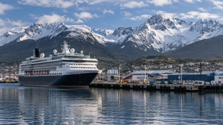Cruise ship at Ushuaia pier beneath Tierra del Fuego mountains