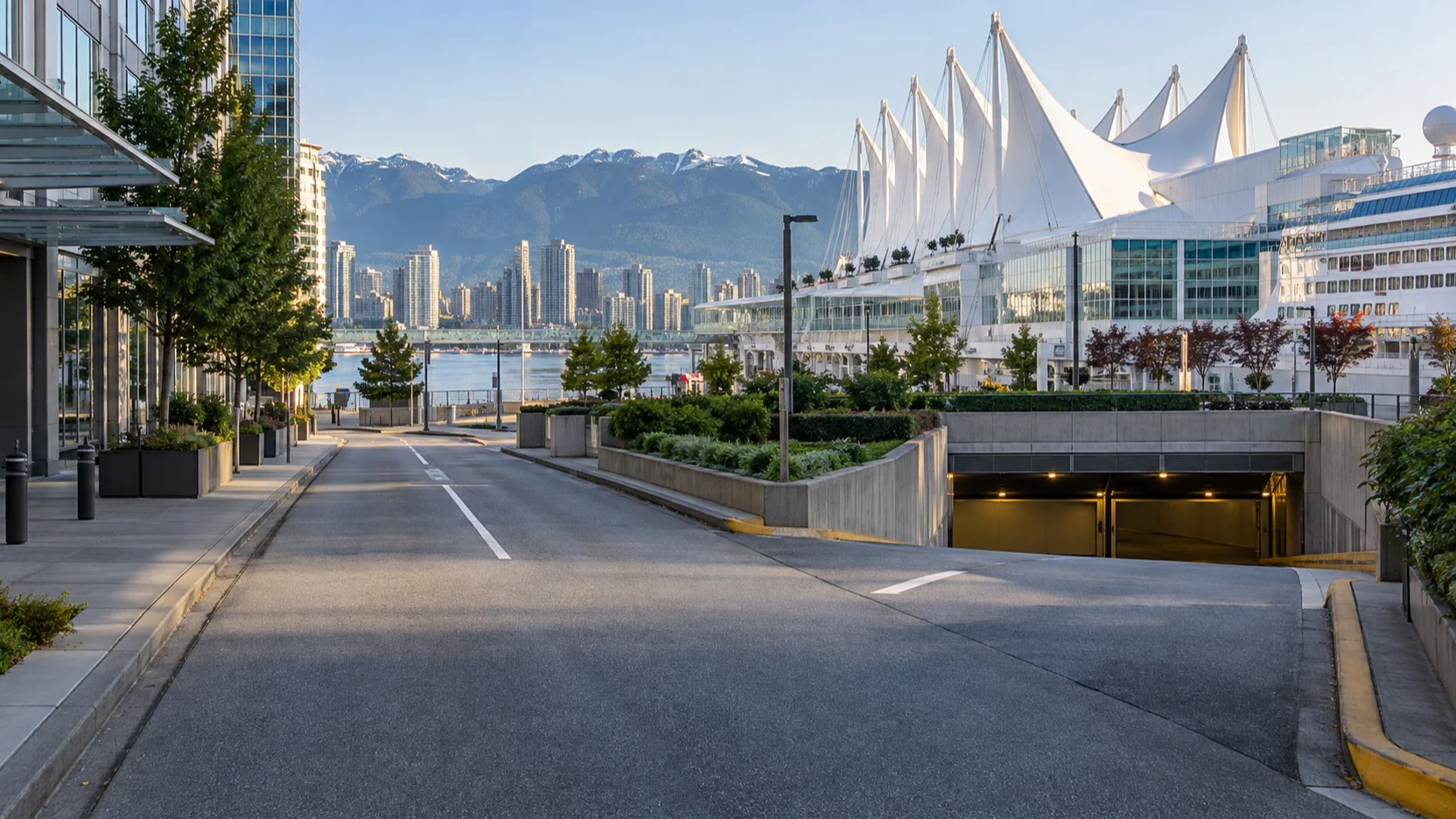 Vehicle approach and parking garage ramp beside Vancouver’s Canada Place cruise terminal